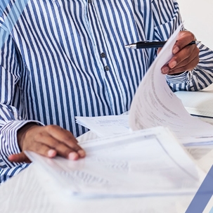 person looking at paperwork